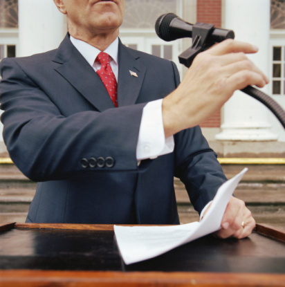 A politician at a lecturn