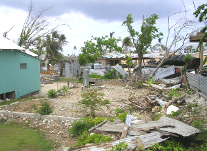 Photo take just outside downtown George Town, Grand Cayman. Actually, areas of unrepaired hurricane damage were relatively rare, seven months after the event. Hurricane Ivan, a category 5 storm, hit Grand Cayman on September 12, 2004.