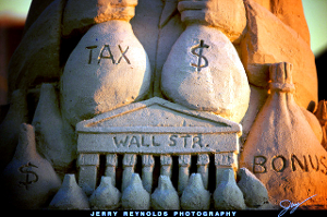 Wall Street depicted in sandcastle form.