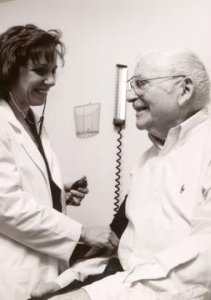 Doctor examining patient