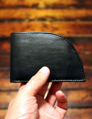 lost_wallet A hand holding a wallet.