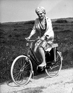 The Dutch queen Juliana riding a bike during a visit to the island Terschelling. The Netherlands, July 11, 1967.