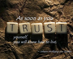 The word “trust” spelled in Scrabble letters. The full quote in the picture, taken from Goethe, reads, “As soon as you trust yourself, you will know how to live.”