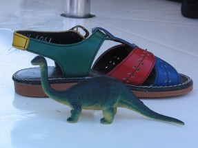 dinosaur shoe tax
