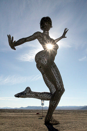 finding_bliss The Bliss Dancer statue from Burning Man 2010. It's a frame statue of a nude woman, dancing by herself.