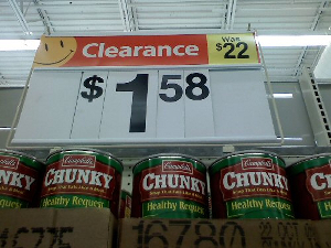 discount_shopping A Wal-Mart sign that claims the soup – which is now $1.58 per can – used to cost $22.