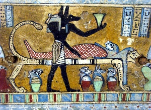 "The 21st Dynasty brought forth its most advanced skills in embalming and the mummification process reached its peak. The bodies' abdomens were opened and all organs, except for the heart, were removed and preserved in Canopic jars. The jars had the heads of four gods. The gods looked after the organs in which were placed in the jar of the god who looked after it. The brain, thought to be useless, was smashed and pulled out through the nose with hooks, then discarded. It was also drained through the nose after being liquefied with the same hooks."