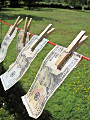 Money hung out to dry on a clothesline