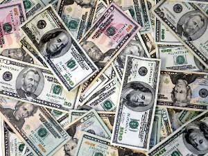 chexsystems A pile of U.S. paper money.