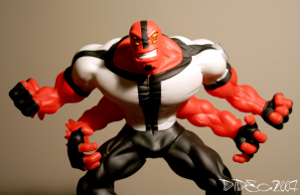 moving_to_another_planet_2 A red, four-armed alien action figure from the "Ben 10" toy line.