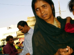 Begging woman in Bangalore, India.