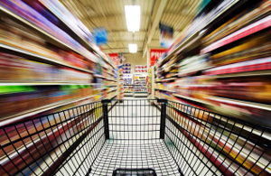 groceries_for_gas Motion blur shot of a grocery cart speeding through a store aisle.